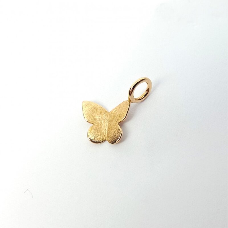 "papillon", pendentif en or rouge 18kt.