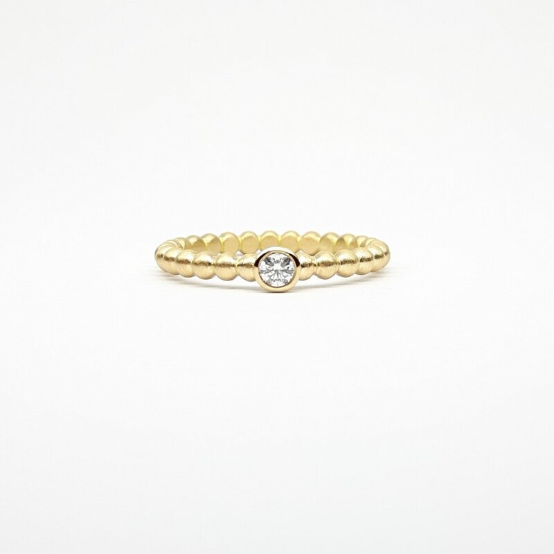 "round around", bague boules en or jaune 18kt et diamant 0,10ct.