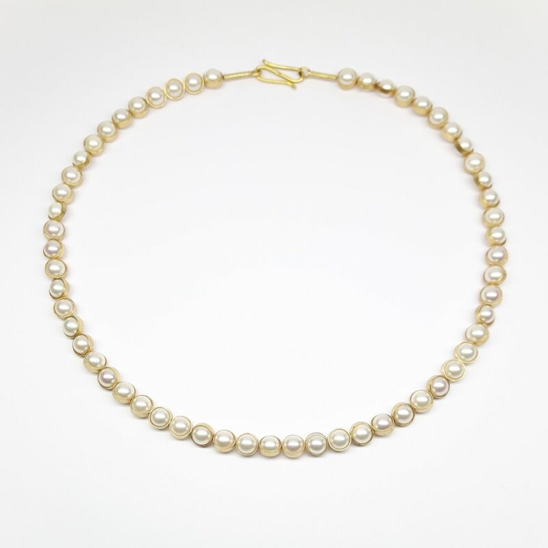 Collier en or jaune 18kt et perles akoya Ø6-6,5mm.