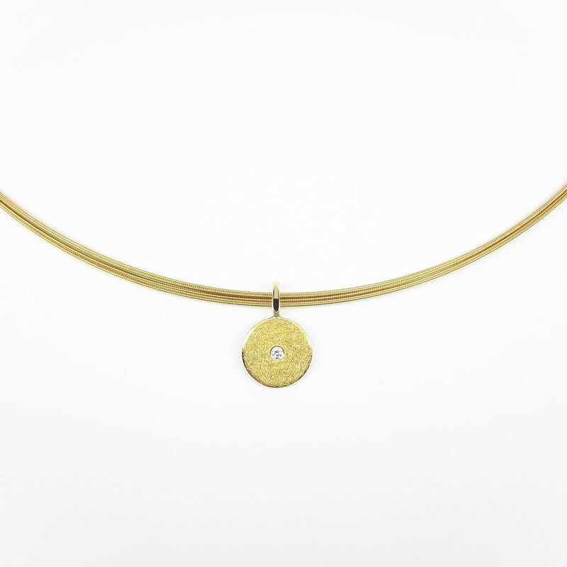 Pendentif en or fin, or jaune 18kt, argent 925-. et diamant.