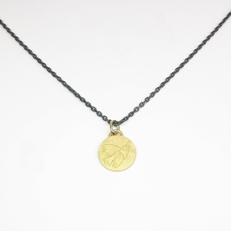 "colombe de paix", pendentif en or jaune 18kt.