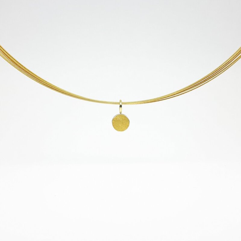 Pendentif en argent 925/-, or fin et or jaune 18kt.