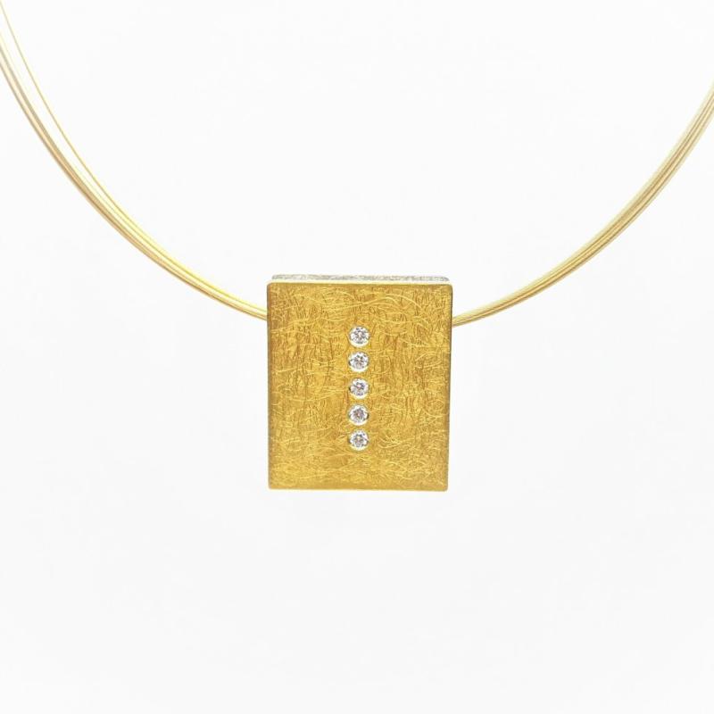 Pendentif en or fin, argent 925/- et 5 brillants.