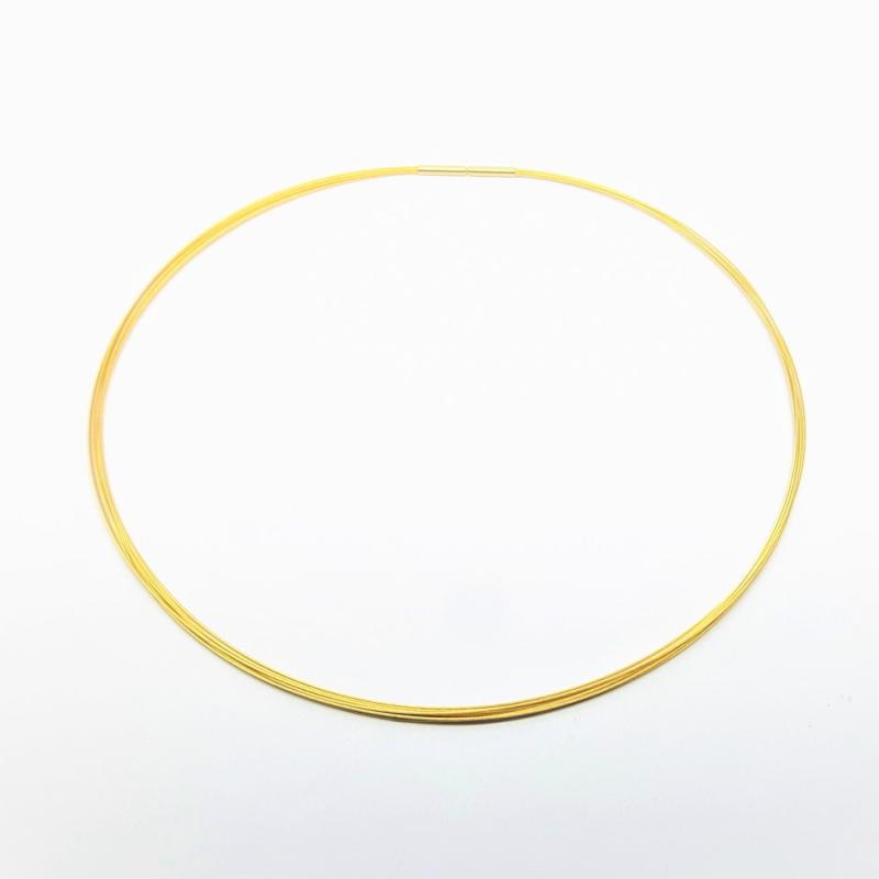 Pendentif en or fin et argent, se porte des deux côtés.