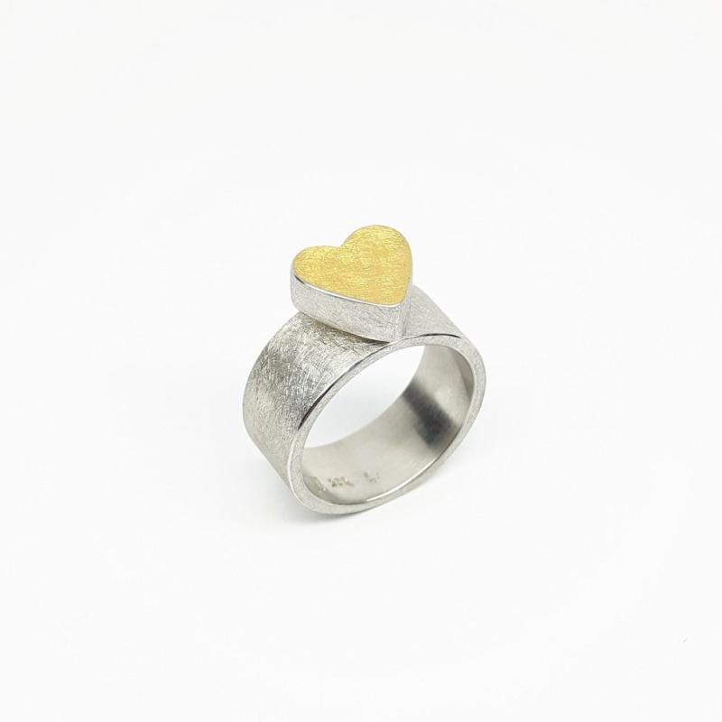 Bague coeur en argent 925/- et or fin.