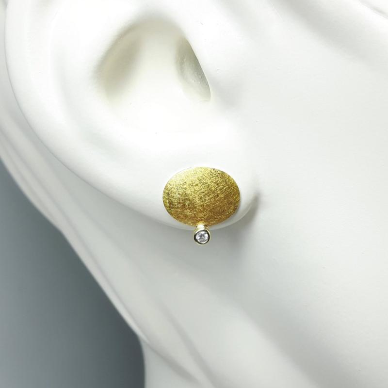 Boucles d'oreilles en argent 925/-, or fin, or jaune 18kt et brillants.