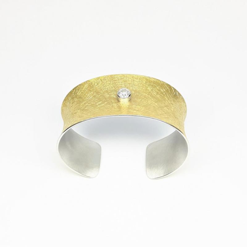 Bracelet en or jaune 22kt, argent et 1brillant. de 0,50ct.