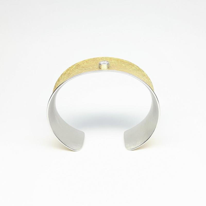 Bracelet en or jaune 22kt, argent et 1brillant. de 0,50ct.