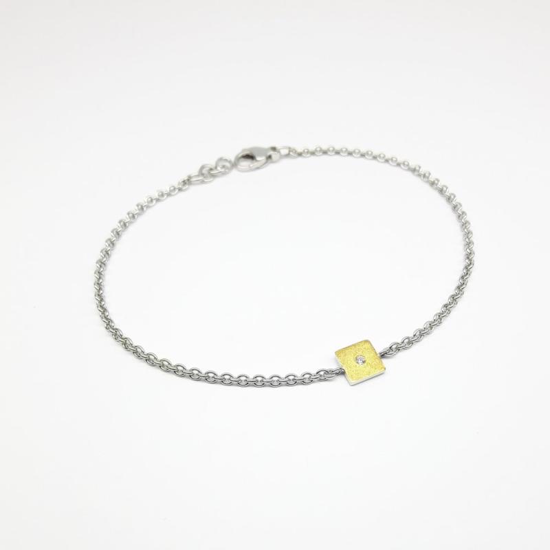 Bracelet en or fin, argent 925/- et brillant.