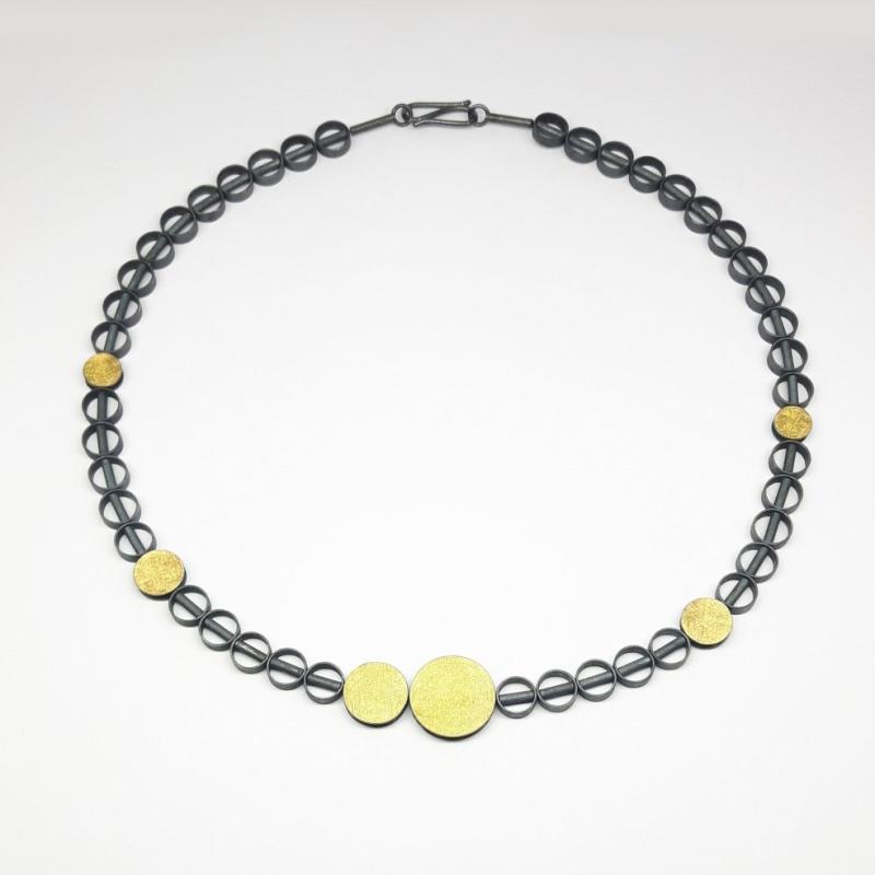 ollier en or fin 24kt et argent 925/- noirci.