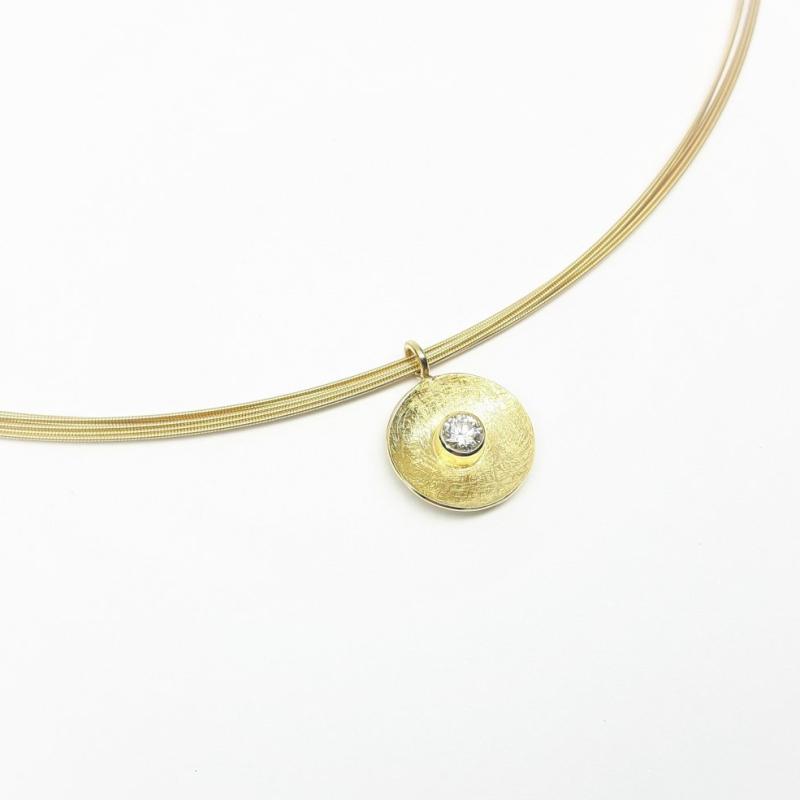 Pendentif en or jaune 18kt avec 1 brillant 0.20ct.
