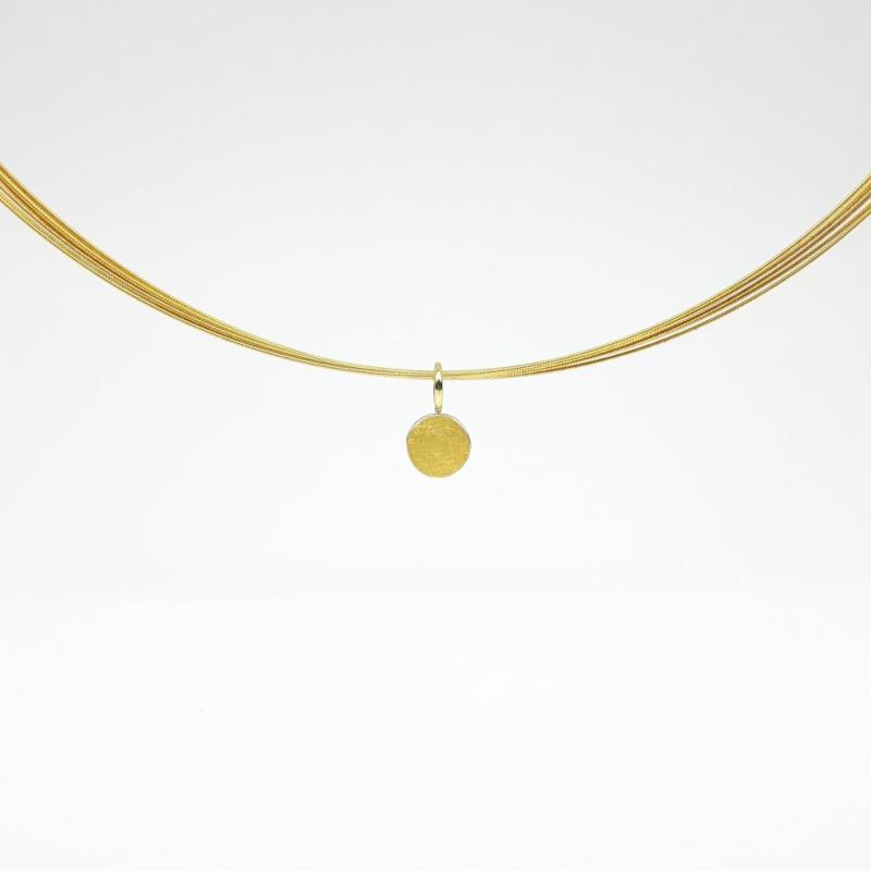 Pendentif en argent 925/-, or fin et or jaune 18kt.