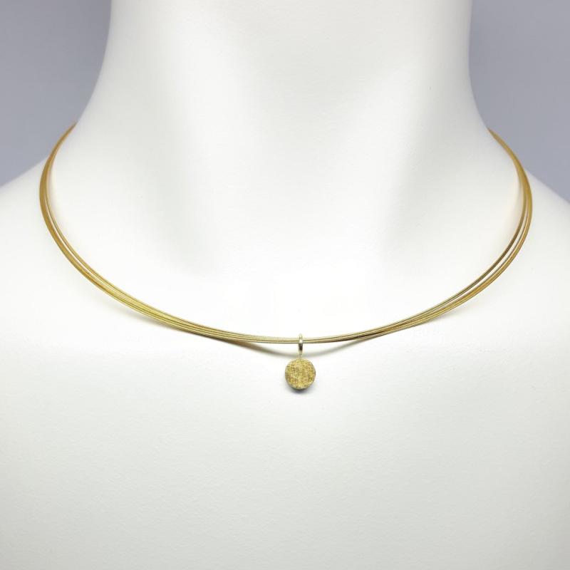 Pendentif en argent 925/-, or fin et or jaune 18kt.