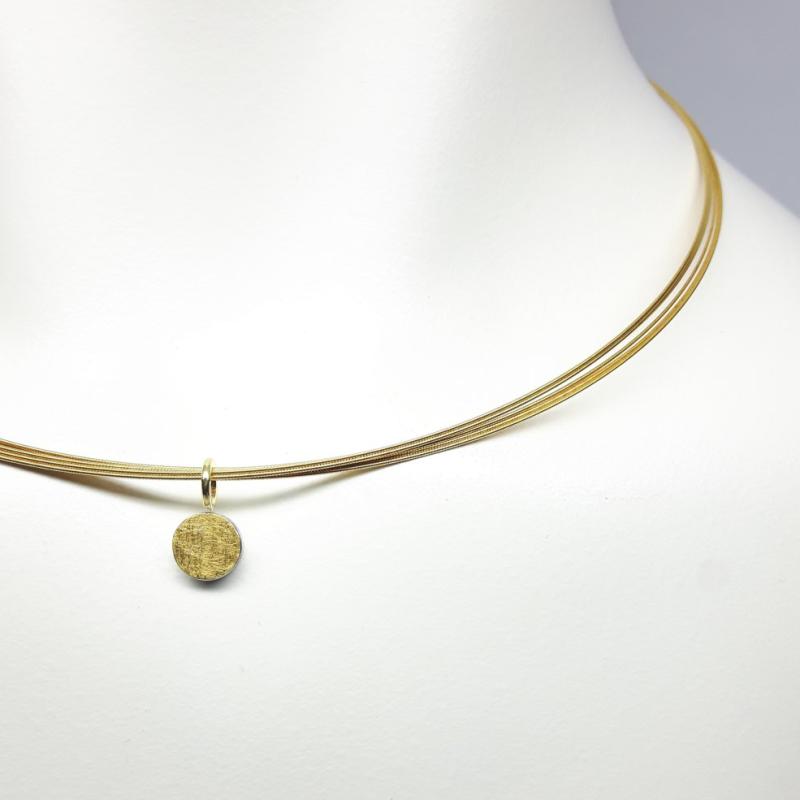 Pendentif en argent 925/-, or fin et or jaune 18kt.