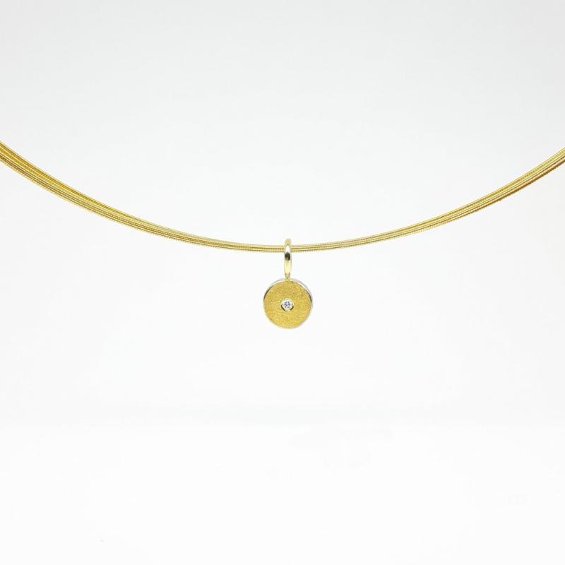 Pendentif en argent 925/-, or fin, or jaune 18kt et diamant.